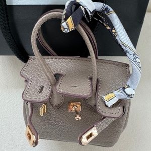 Leather artisan made tiny keychain purse exquisite detail